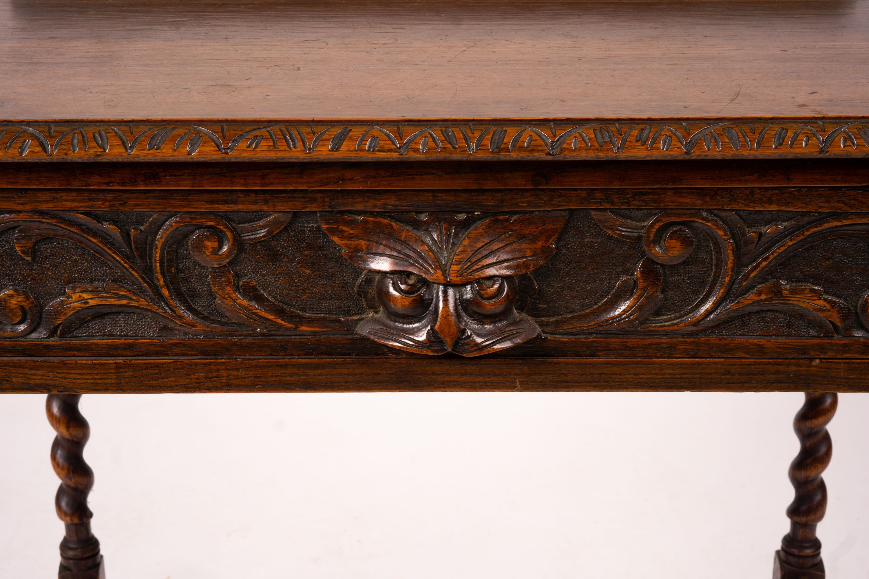 An early 20th century Flemish carved oak side table, W.69cm D.46cm H.77cm